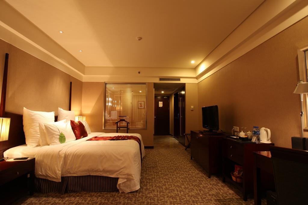 Ruiwan New Century Hotel Tianjin Quarto foto