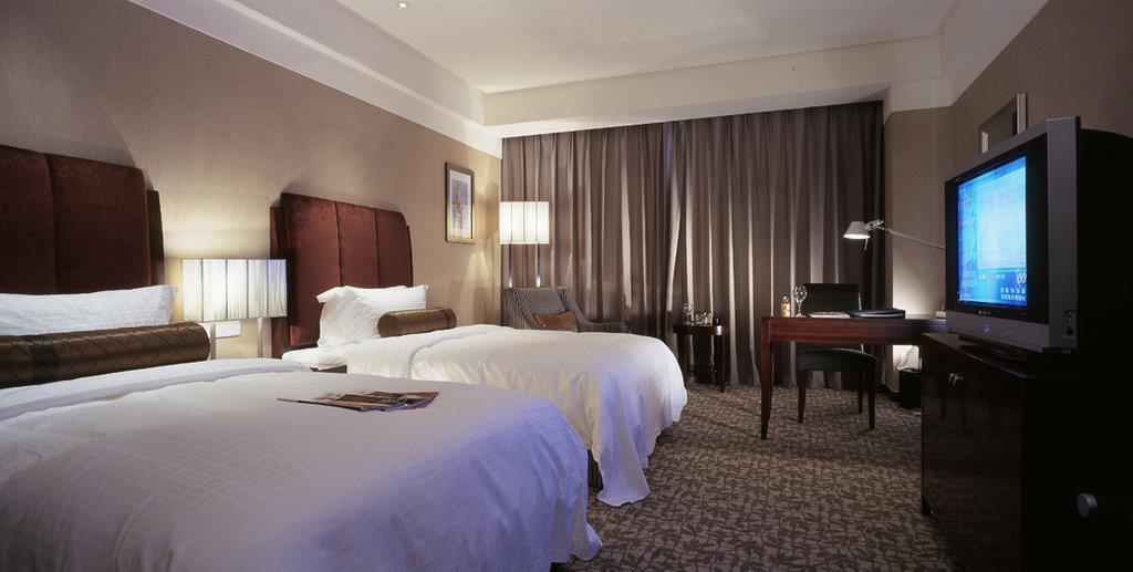 Ruiwan New Century Hotel Tianjin Quarto foto
